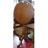 A 19th century mahogany circular tilt-top table, on tripod base