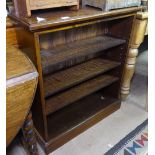 A small oak open bookcase with adjustable shelves, W76cm