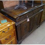 An Antique Continental chiffoniere base, with 2 frieze drawers above figural carved panelled