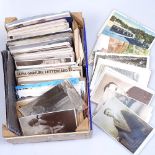 A box of loose British topographical postcards