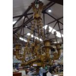 A gilt-metal chandelier with cherub figures, height 50cm approx