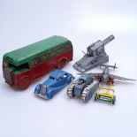 A diecast tank and cannon, a tinplate clockwork bus, 18cm, a plastic aeroplane etc