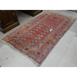 A red ground Turkey rug, 210cm x 120cm