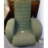 An Art Deco upholstered armchair of stylised form