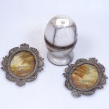 A pair of Antique gilt-brass framed miniatures, height 17.5cm, and a carved soapstone box