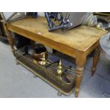 A narrow rectangular pine kitchen table on baluster legs, L151cm, H73cm