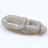 A Chinese carved jade brush washer, 9.5cm