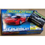 A Scalextric GT Pursuit track and cars, boxed, and a boxed Hypercars