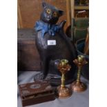 A black cat doorstop with glass eyes, 38cm, candlesticks, and a box of British coins