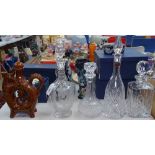 4 crystal decanters and stoppers, tallest 36.5cm, and a wine jug