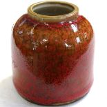 A Chinese red glazed pot, height 6cm