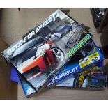 3 boxed Scalextric sets, and a quantity of track