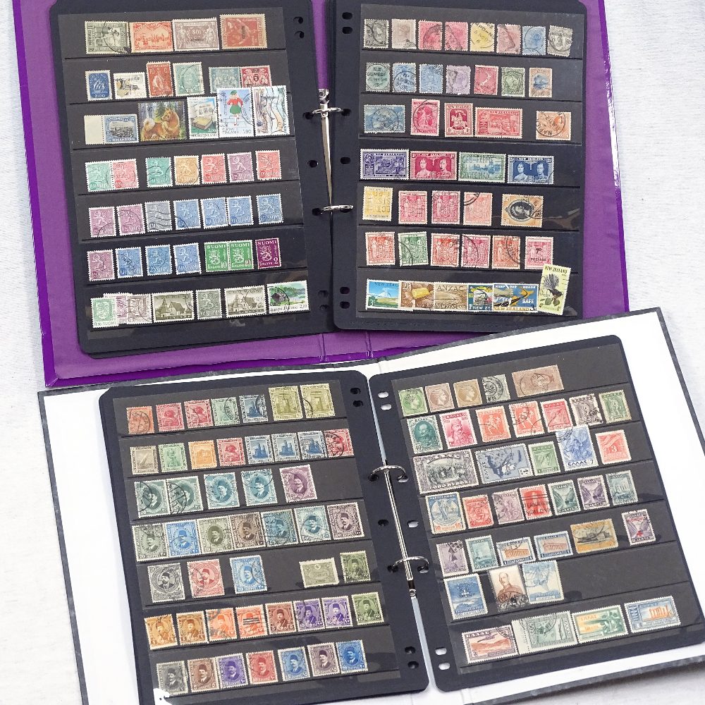 2 albums of Vintage world stamps