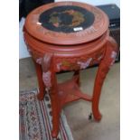 An Oriental red lacquered jardiniere stand with carved decoration, on cabriole legs, W45cm, H72cm