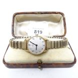 A lady's gold Omega wristwatch with expanding strap, in fitted case (working)