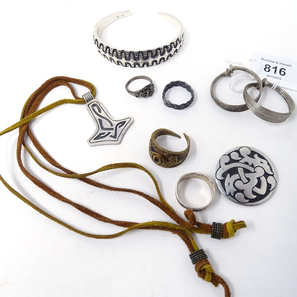 A silver Norwegian Viking design bracelet, a pendant necklace, silver rings and earrings etc