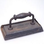 A Victorian cast-iron billiard table flat iron, by John Taylor & Son of Edinburgh, with original