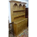 A large modern polished pine 2-section kitchen dresser, W142cm, H200cm