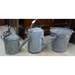 2 galvanised watering cans, and bucket