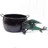 A cast-iron 4-gallon cauldron, and a painted cast-iron bi-plane ornament, length 50cm (2)