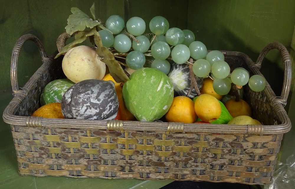 Stone figs and other fruit, polished stone grapes in plated basket