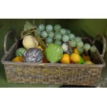 Stone figs and other fruit, polished stone grapes in plated basket