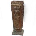 A brass-clad stick stand, with panels depicting Classical maidens, height 66cm