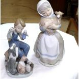 Lladro girl with lamb, 20cm, and Lladro boy with puppets and dogs