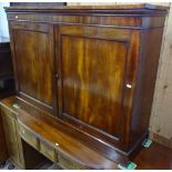 A 19th century mahogany cabinet, with 2 panelled doors, on plinth base, W128cm, H96cm