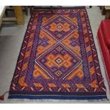 A red ground Ghalmori Kilim rug, 201cm x 99cm