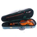 A Stentor half-size violin with bow, in fitted travelling case