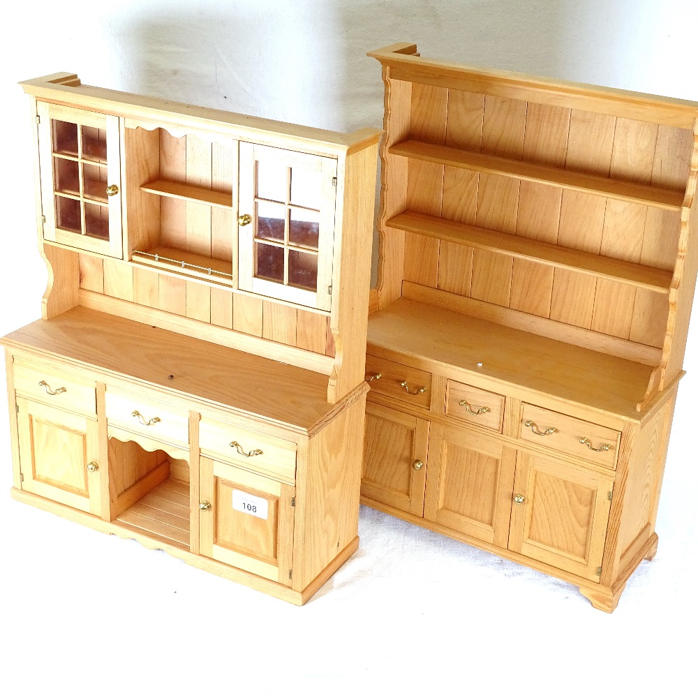 A miniature wooden dresser, height 47cm, and a similar cabinet