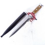 A Swiss Army Officer's Knife with turned wood handle, and scabbard, length 36.5cm