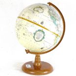 A Repogle 9" terrestrial globe on stand