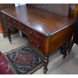 A 19th century mahogany knee-hole writing desk, with 5 short drawers, having Hobbs & Company stamped