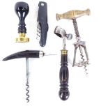 A Columbus corkscrew, another with ebony handle and pick, a seal etc