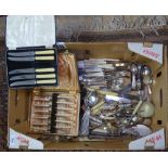 A box containing miscellaneous plated cutlery