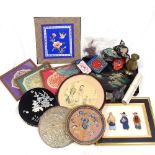 Various Oriental items, including pictures, embroidery, and brassware