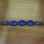 A Chinese silver filigree and lapis lazuli bracelet, maker's marks EPF, bracelet length 17cm, 42.9g