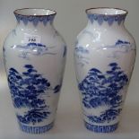 A pair of Japanese porcelain vases, signed, 30cm