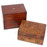 A box with marquetry bands, and a mahogany box with inset brass handles, 24cm across