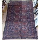 A red ground Afghan rug, 196cm x 130cm