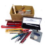 A box of Vintage pens etc