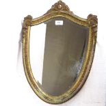 A shield-shaped bevelled-edge wall mirror, 52cm