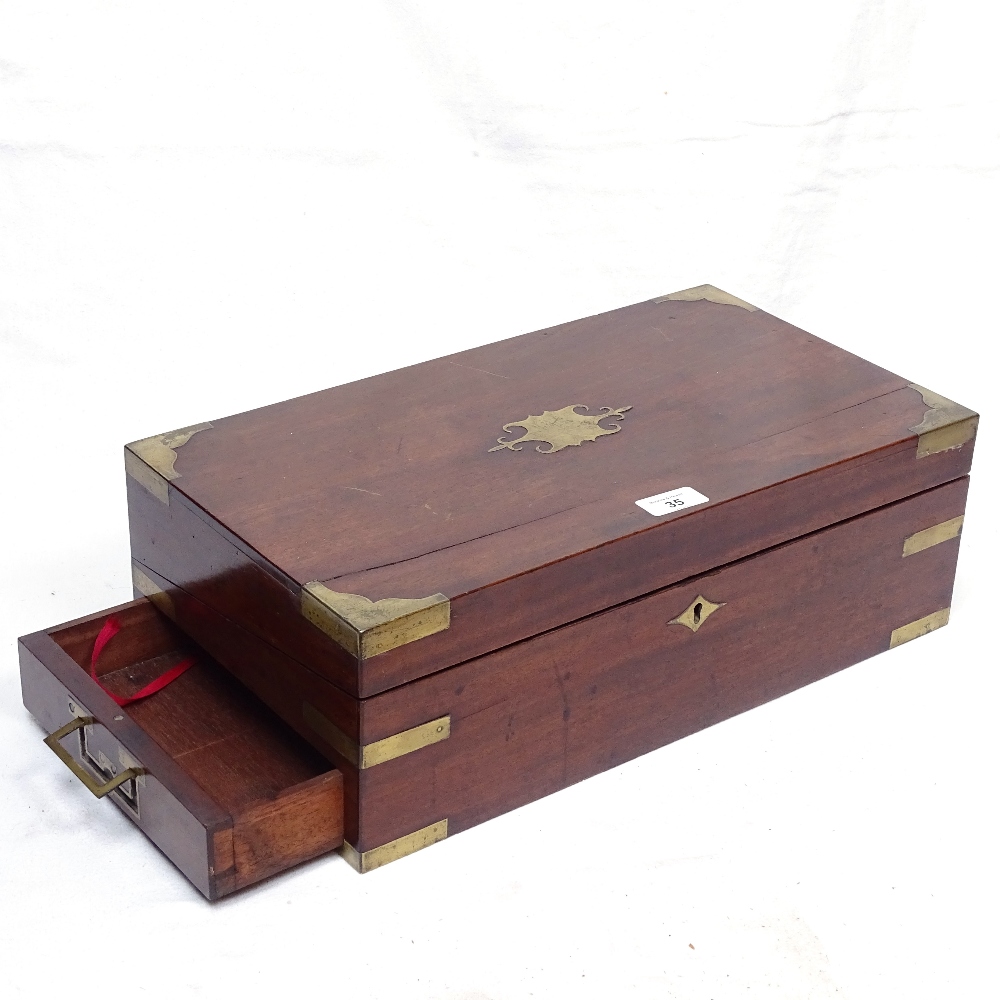 A Victorian brass-bound mahogany writing slope with fitted interior, length 45cm