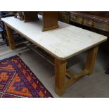 A large rectangular pine refectory table, on H-shaped base, L212cm, D91cm, H75cm