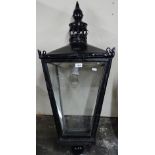 An Antique black painted outdoor lantern, By Foster & Pullen, with ceramic Parkinson reflector & gas