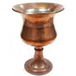 An engraved copper pot with pedestal stand, H56cm