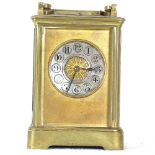 A brass-cased carriage clock
