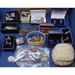 A box containing wristwatches, penknives, cufflinks etc